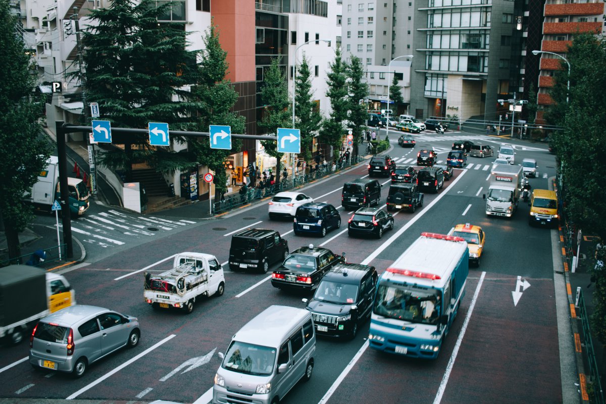 cars in tokyo driving on the street