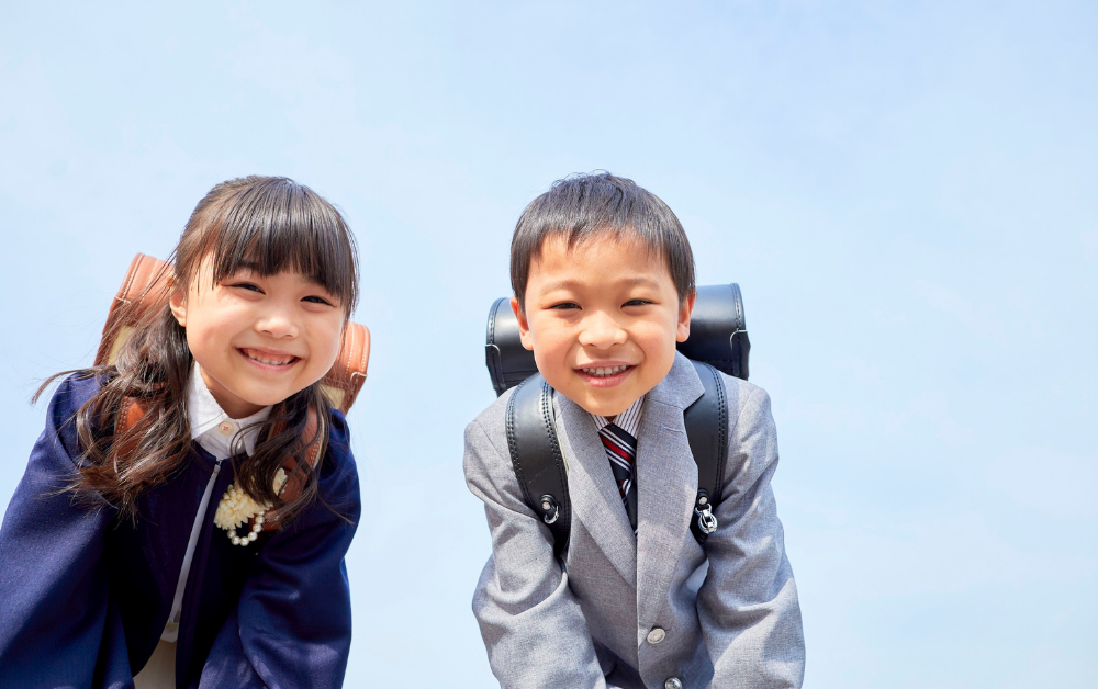 Two Japanese kids going to school alone