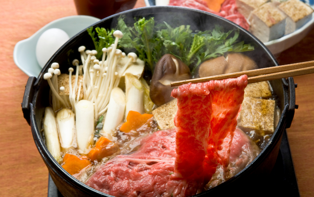 Nabe (鍋) – communal hotpot dishes such as sukiyaki, shabu-shabu, or kimchi nabe, where everyone cooks together at the table.