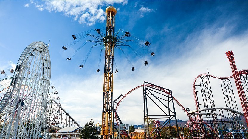 blog post image of the Fuji-Q Highland and its iconic themepark rides located in japan, near mount fuji