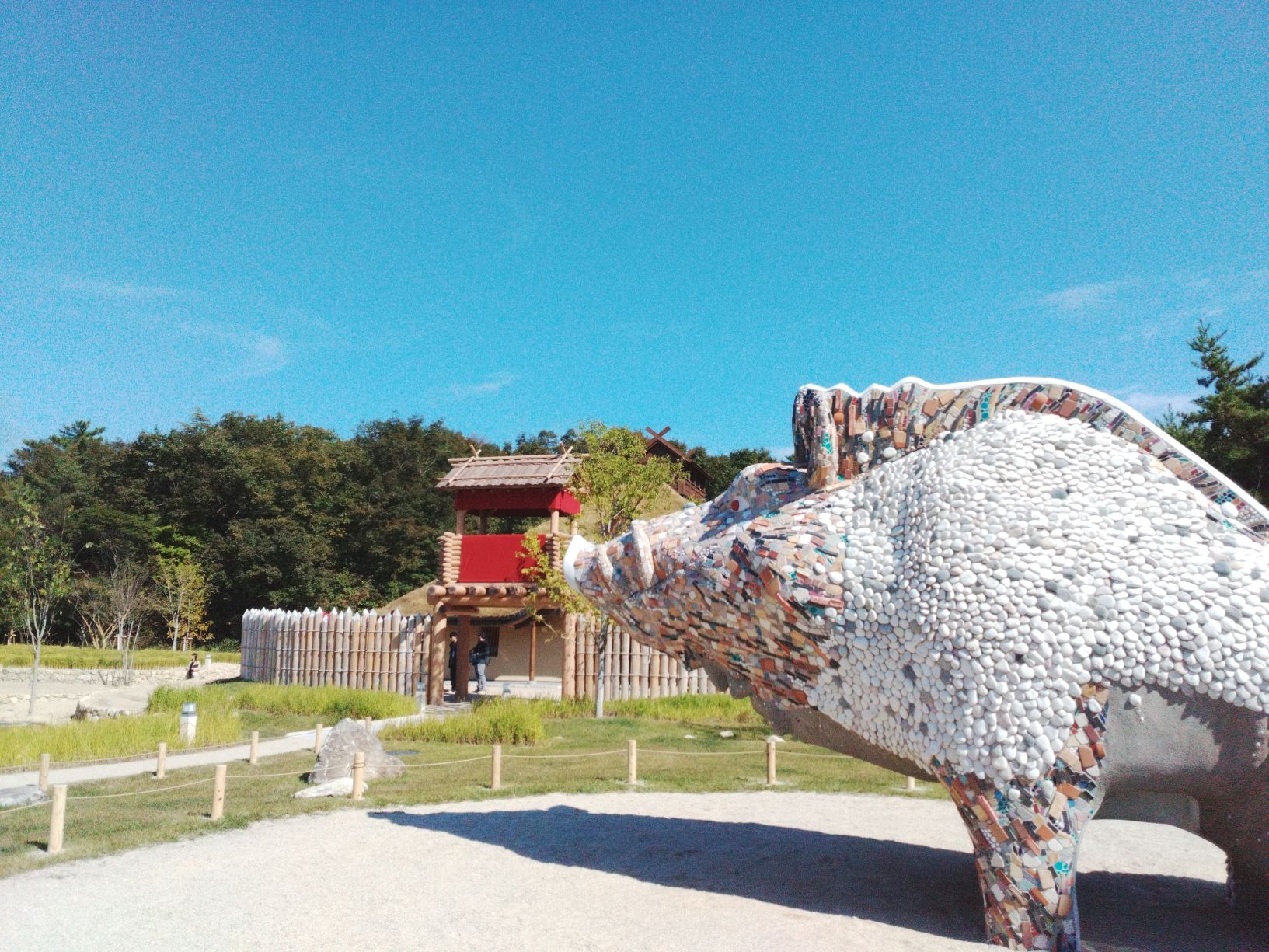 blog post image of momonoke village located at ghibli park in japan