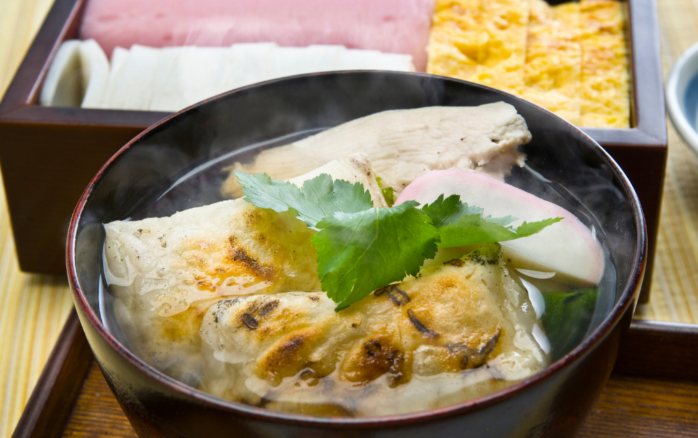 Ozōni (お雑煮) – a traditional New Year’s soup with mochi, vegetables, and chicken or seafood, varying by region.